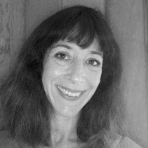 Black and white photo of Amy Rosenthal smiling