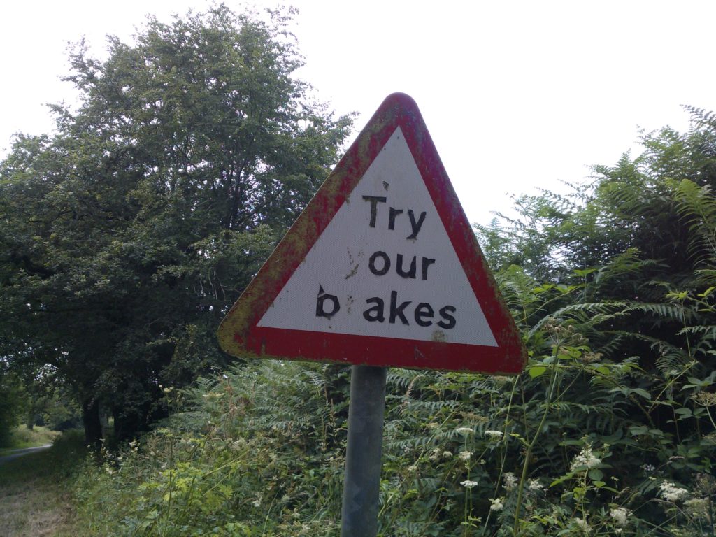Try your breaks road sign