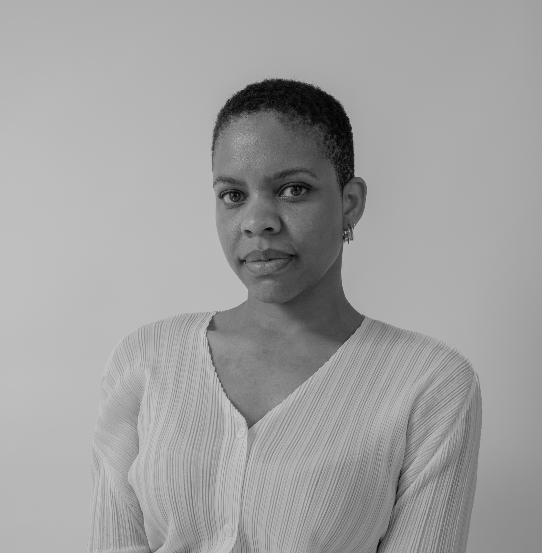 Black and white photo of Vanessa Onwuemezi (Photo credit: Lewis Khan)