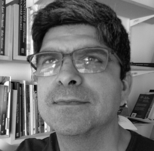 Close-up photo of Ardashir Vakil in black and white.